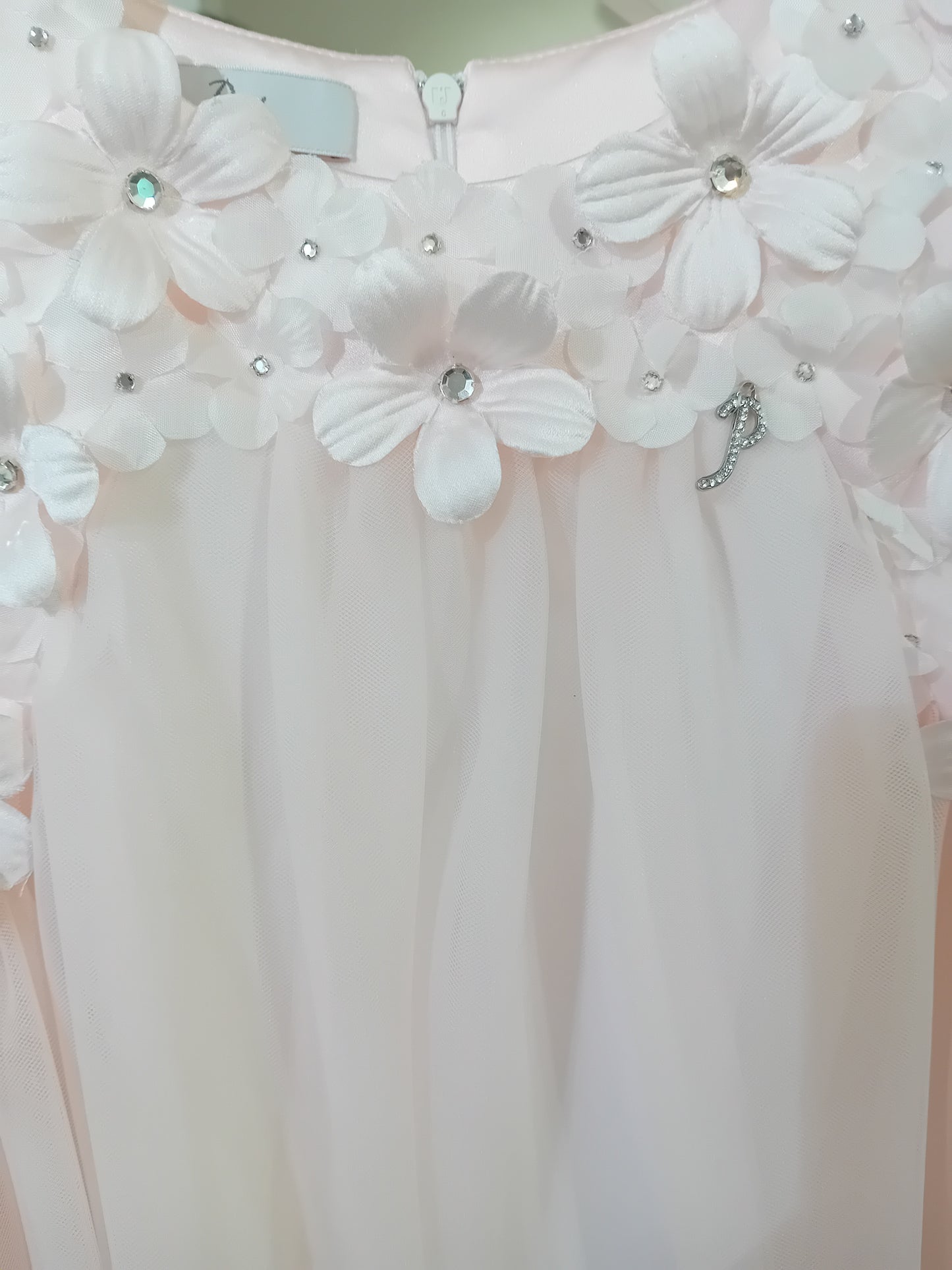 Abito Petit rosa con fiori sopra